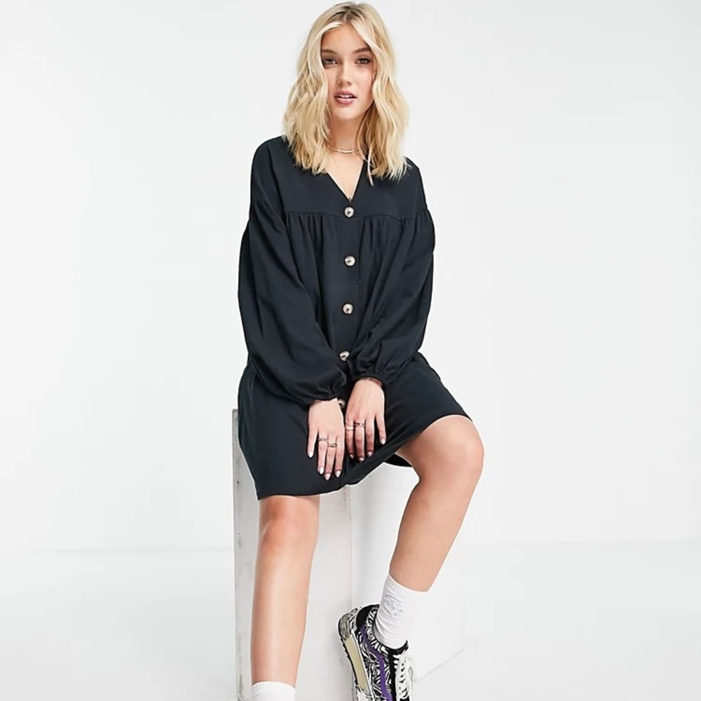 Light black , button through mini smock dress with long sleeves.